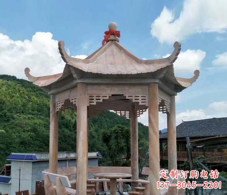 嘉兴一流的公园晚霞红六角石雕凉亭